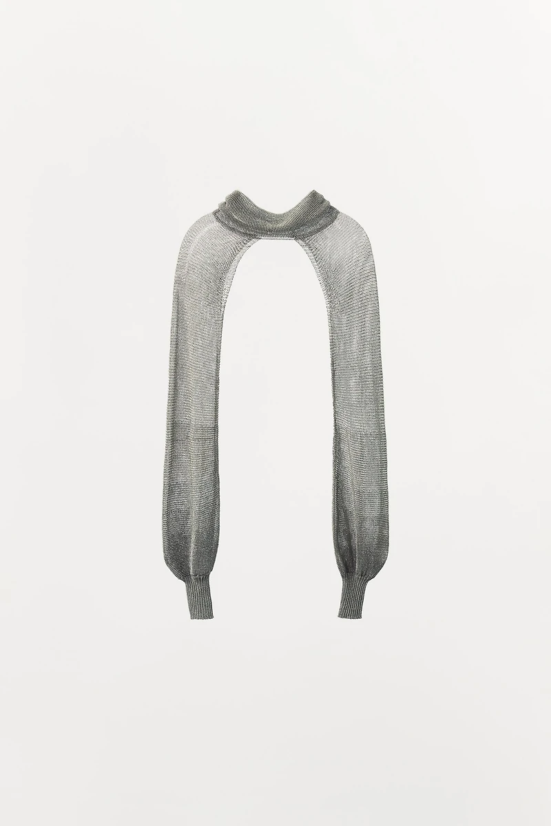 PULL STYLE MANCHONS EN MAILLE AVEC FIL MÉTALLISÉ ÉDITION LIMITÉE