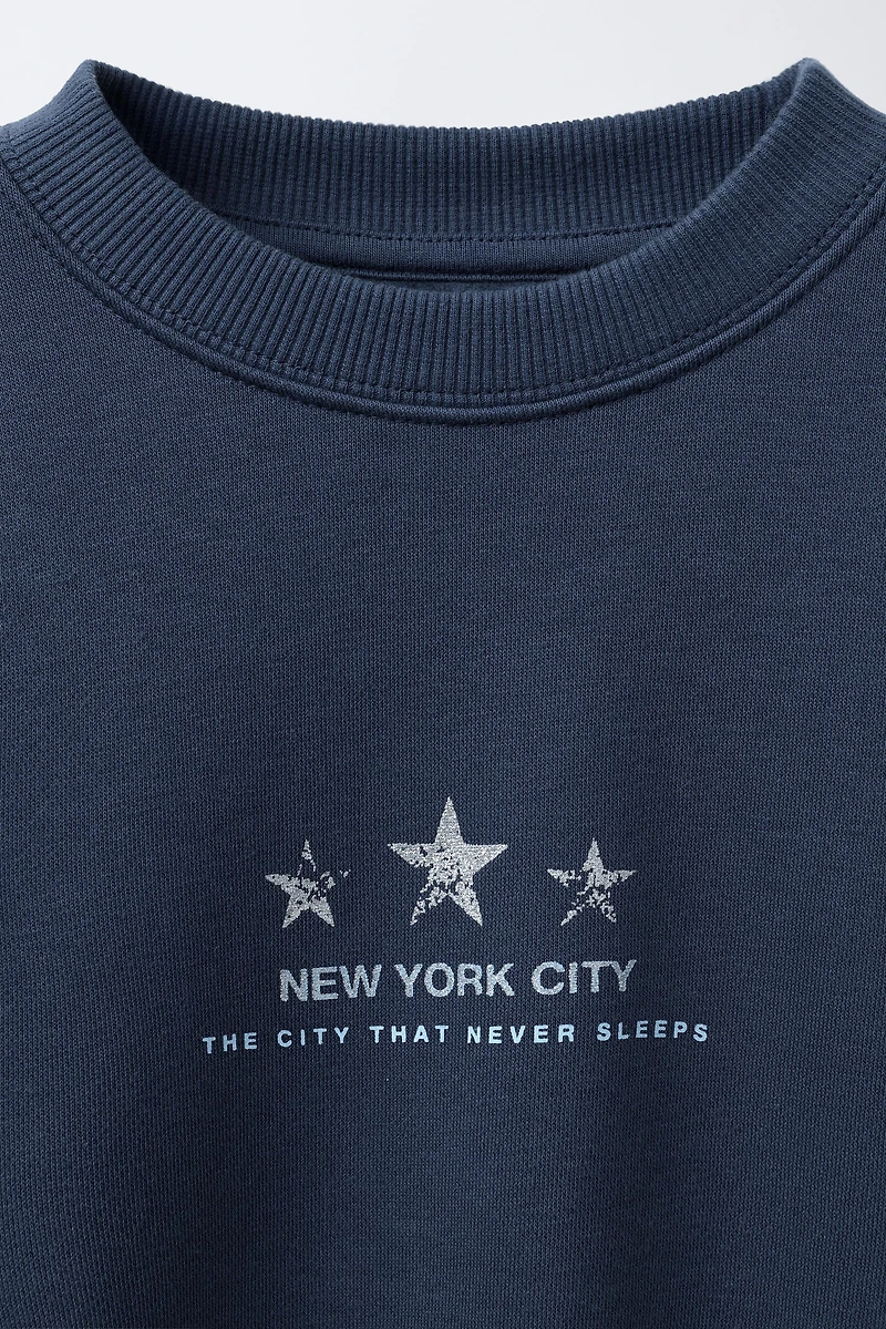 SPARKLY STAR PRINT SWEATSHIRT