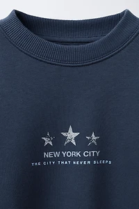 SWEAT À IMPRIMÉ ÉTOILES BRILLANTES