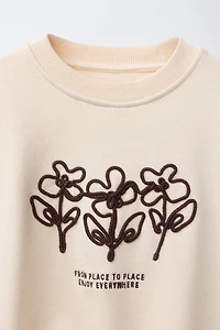 SWEAT BRODÉ AVEC LACET