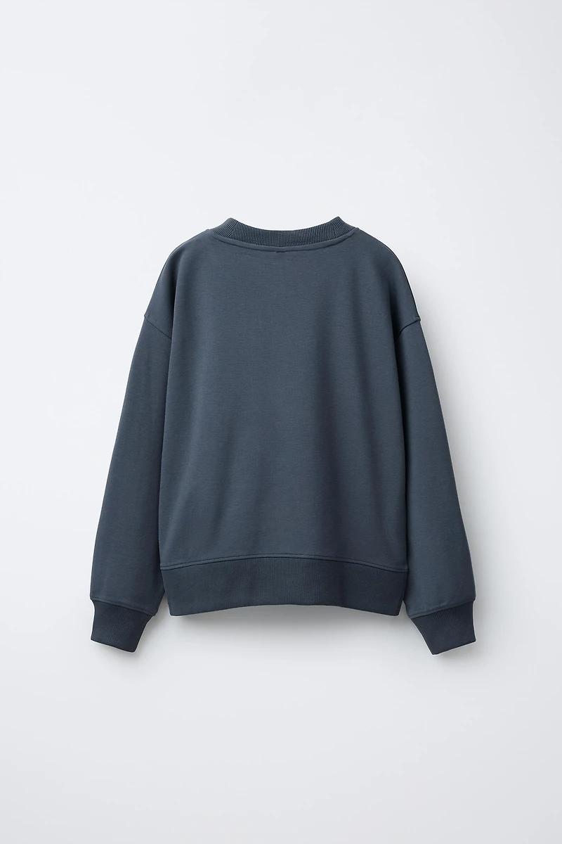 ENSEMBLE SWEAT ET PANTALON EN MOLLETON À JAMBES LARGES UNIE