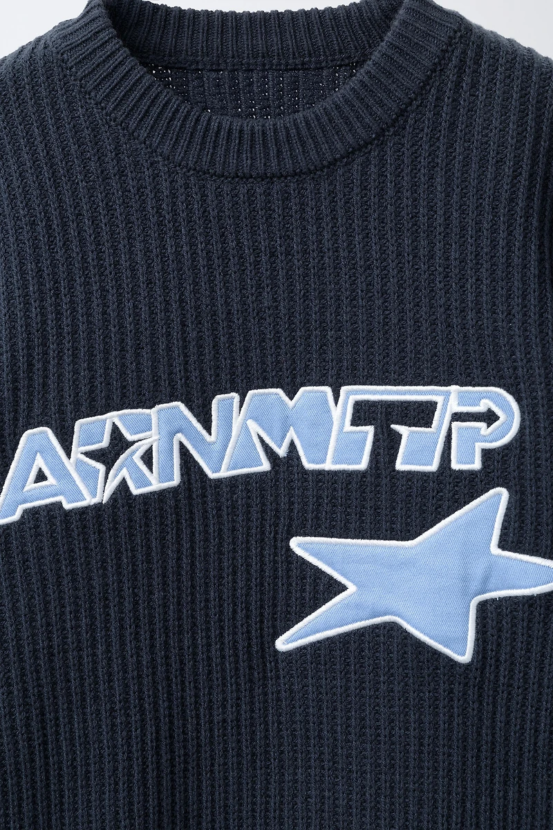 TEXT PATCH KNIT JUMPER