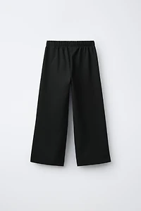 PANTALON EN MAILLE POINT ROMA À JAMBES LARGES