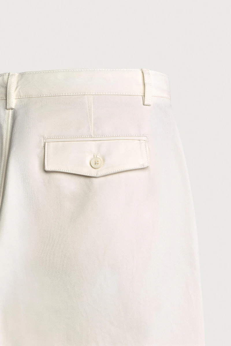 STRAIGHT FIT PLEATED PANTS
