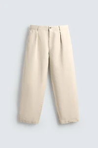 RELAXED FIT PLEATED PANTS