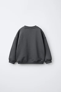 DINOSAUR PRINT SWEATSHIRT