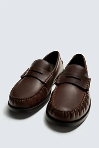 MOCASSINS EN CUIR À MASQUE