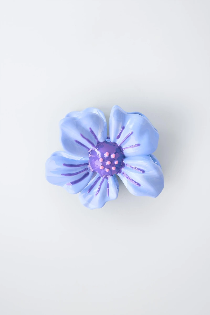 PINCE EN FORME DE FLEUR