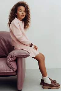 PLEATED KNIT SKIRT