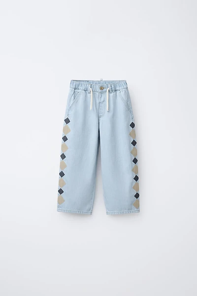 EMBROIDERED WIDE LEG JEANS