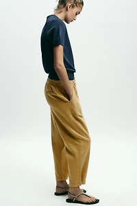 JOGGER PANTS WITH BUTTONED HEM