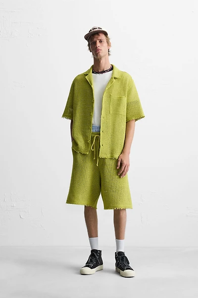 TEXTURED SHORTS WITH OPENWORK DETAIL