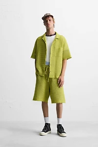 TEXTURED SHORTS WITH OPENWORK DETAIL