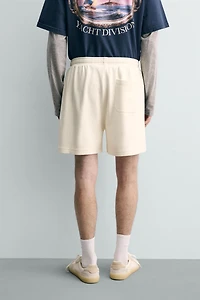 BERMUDA JOGGING BANDES CONTRASTÉES