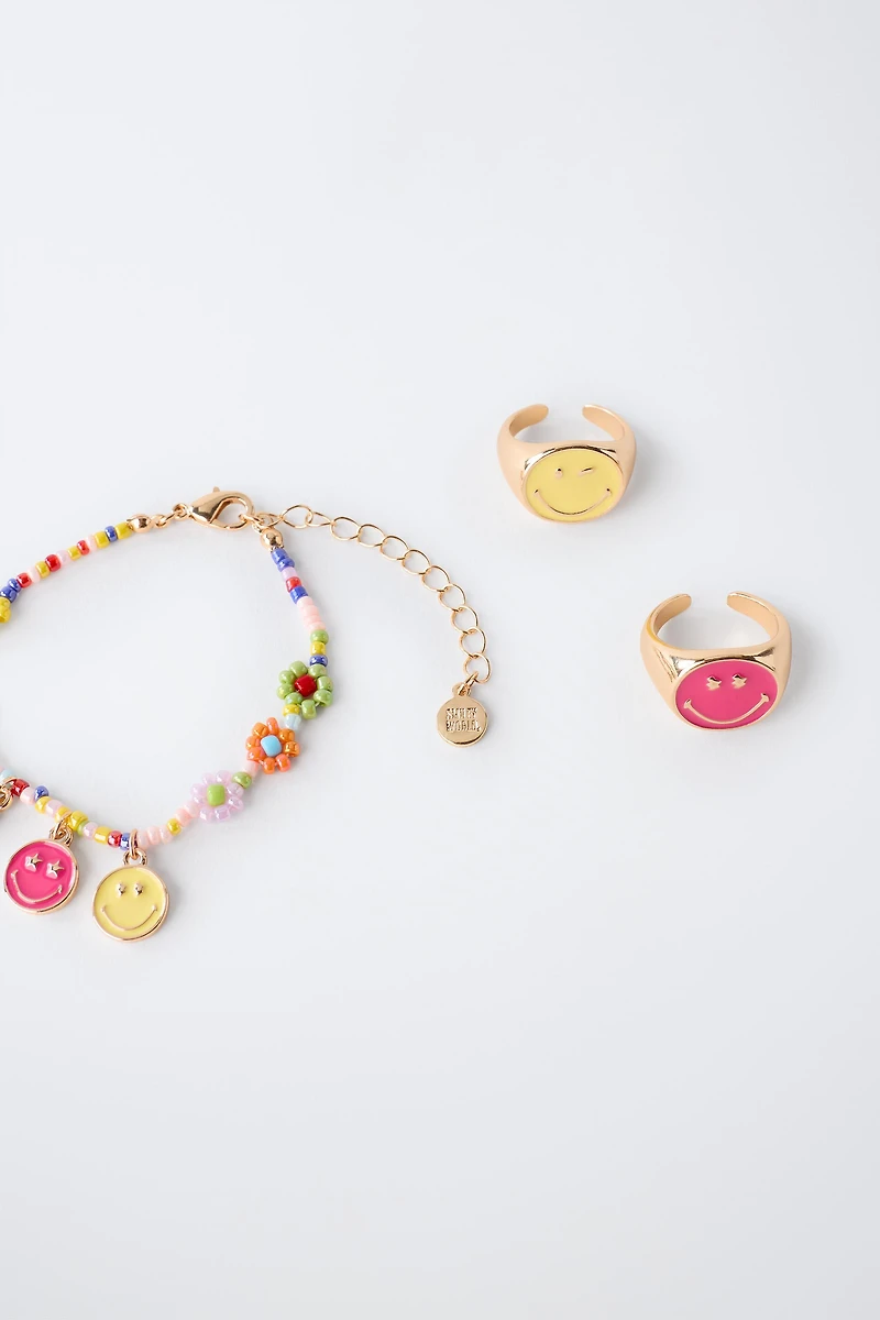PACK OF RINGS AND BEADED BRACELET SMILEYWORLD ®