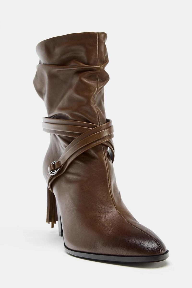 FRINGED LEATHER ANKLE BOOTS