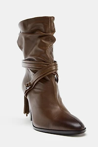 FRINGED LEATHER ANKLE BOOTS