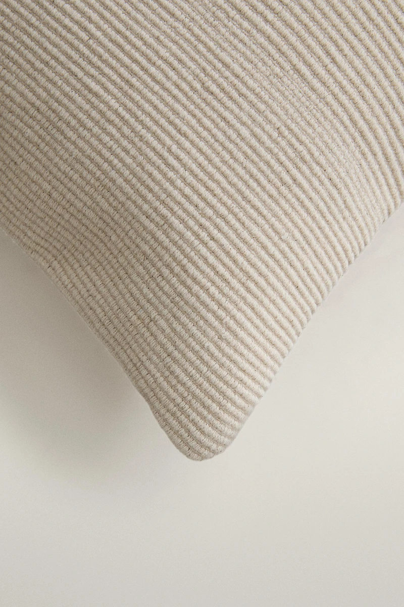 HOUSSE DE COUSSIN TRESSÉE