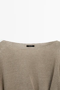 Oversize knit linen sweater with button detail