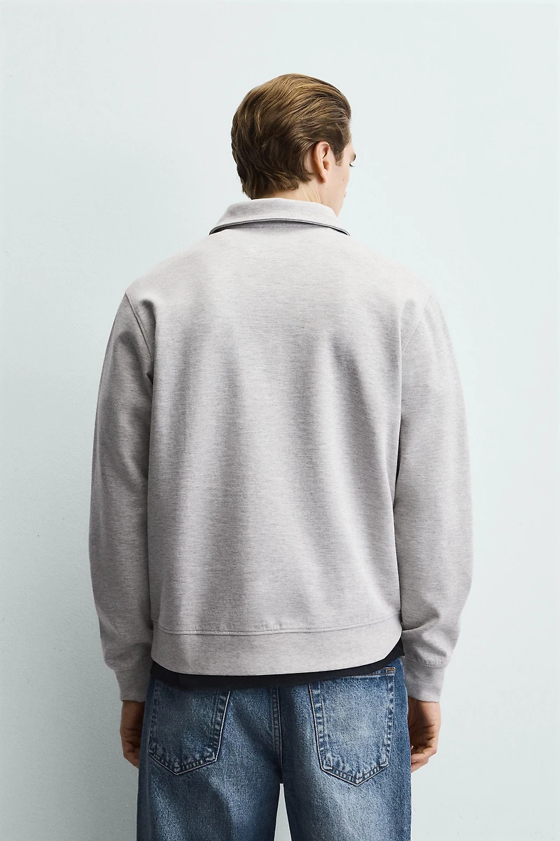 INTERLOCK ZIP POLO SWEATSHIRT