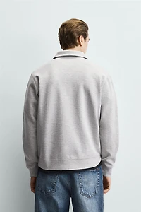 INTERLOCK ZIP POLO SWEATSHIRT