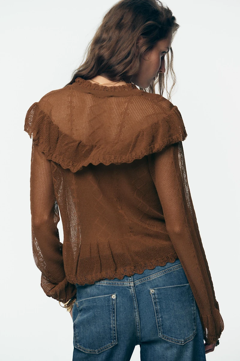 GILET ROMANTIQUE EN MAILLE POINTELLE