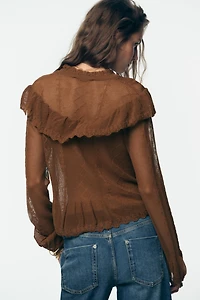 GILET ROMANTIQUE EN MAILLE POINTELLE