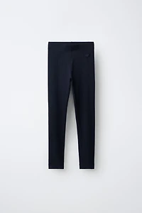 LEGGING CÔTELÉ À ÉTIQUETTE