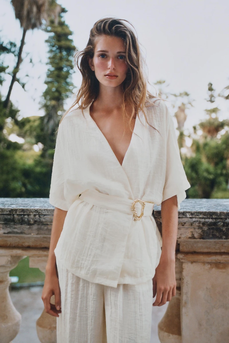 BELTED TOP WITH BUCKLE
