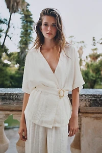 BELTED TOP WITH BUCKLE