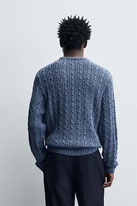 PULL STRUCTURÉ À TORSADES