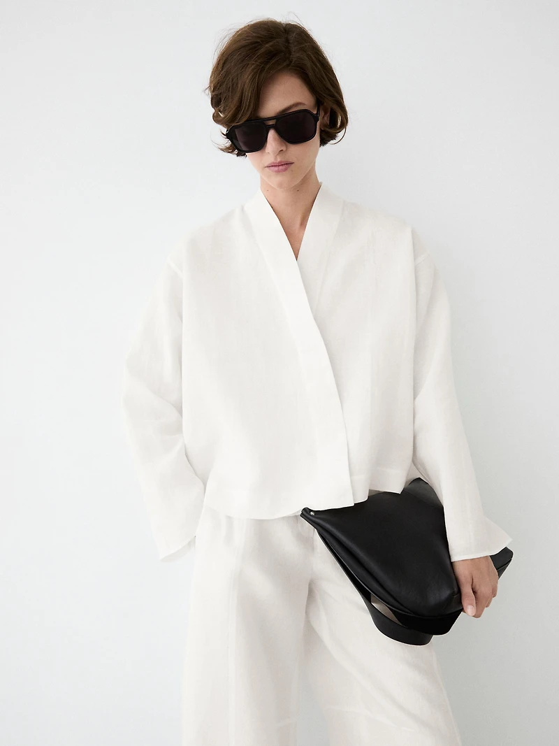 Flowing linen blouse with surplice neckline