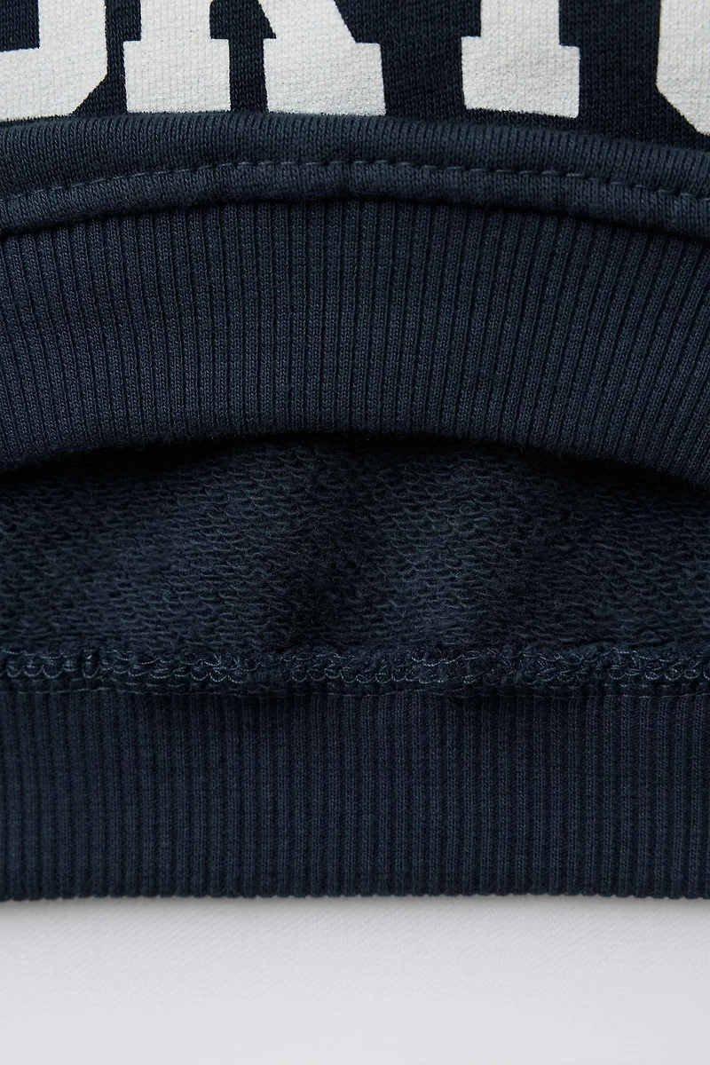 TEXT PATCH SWEATSHIRT