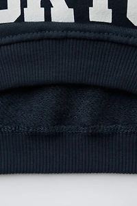 TEXT PATCH SWEATSHIRT