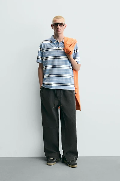 STUDDED FAUX LEATHER RELAXED FIT PANTS