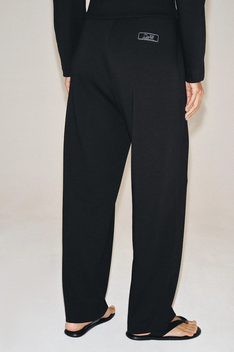 CROPPED WIDE-LEG TROUSERS