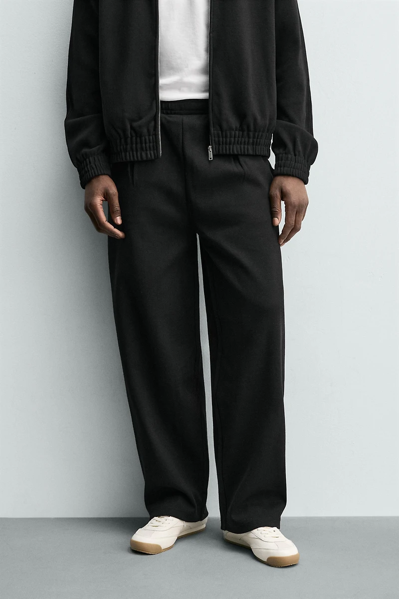 PLEATED WIDE FIT JOGGER PANTS