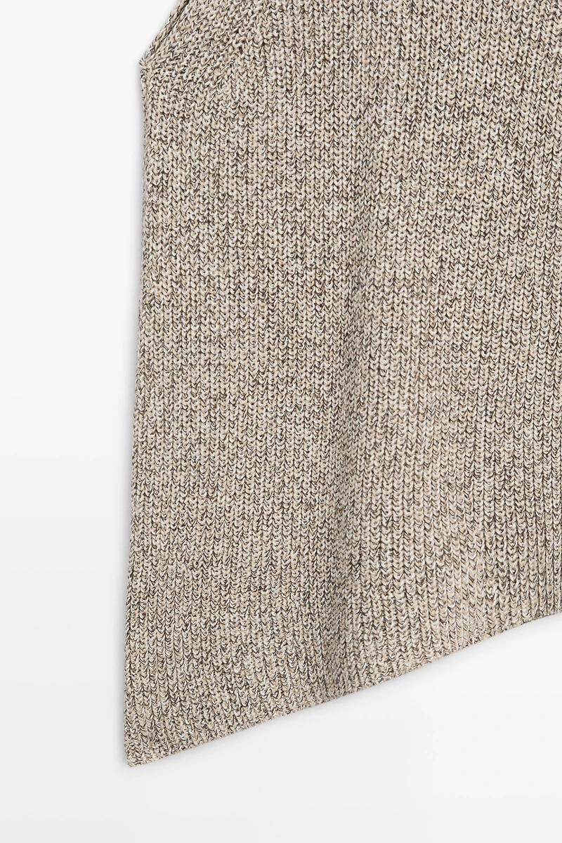 Top asymétrique en maille