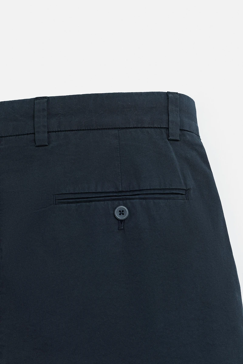 REGULAR FIT PLEATED BERMUDA SHORTS