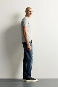 DISTRESSED SKINNY FIT JEANS
