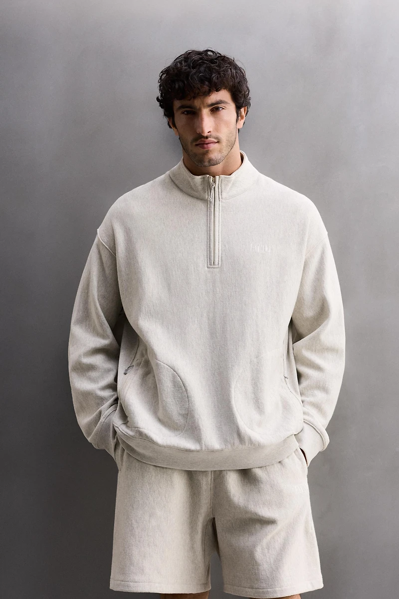 QUARTER-ZIP SWEATSHIRT WITH POCKETS