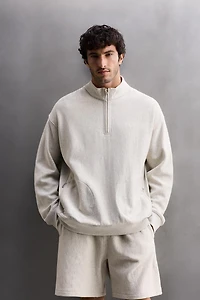 QUARTER-ZIP SWEATSHIRT WITH POCKETS