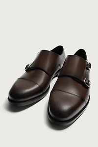 CHAUSSURES EN CUIR DOUBLE BOUCLE