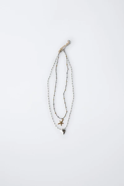 LOT DE DEUX COLLIERS CŒUR ET ÉTOILE