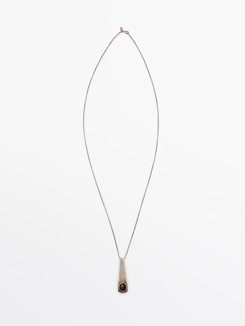 Geometric pendant with stone