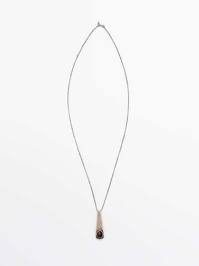 Geometric pendant with stone