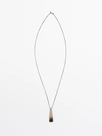 Geometric pendant with stone