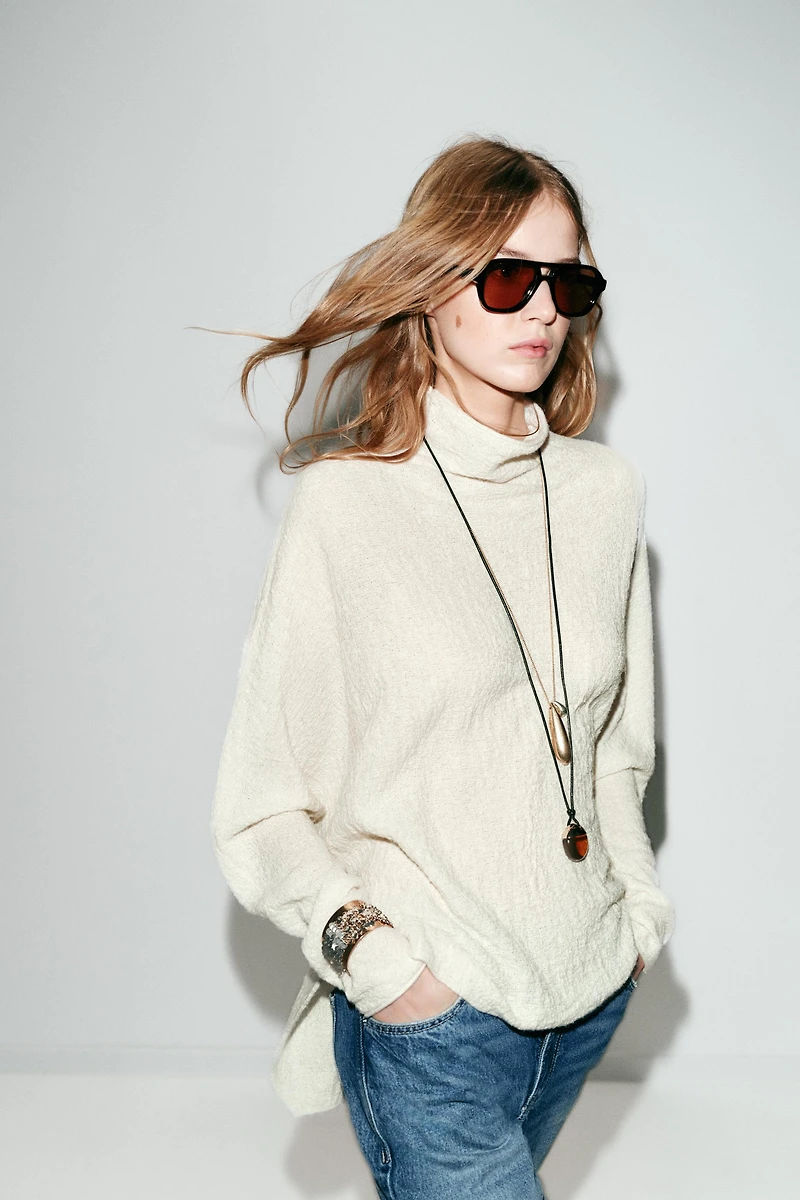 KNIT CAPE JUMPER