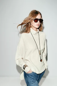 KNIT CAPE JUMPER