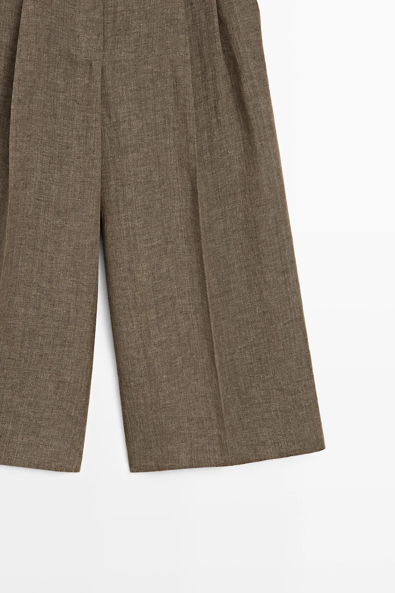 Flowing melange linen Bermuda shorts